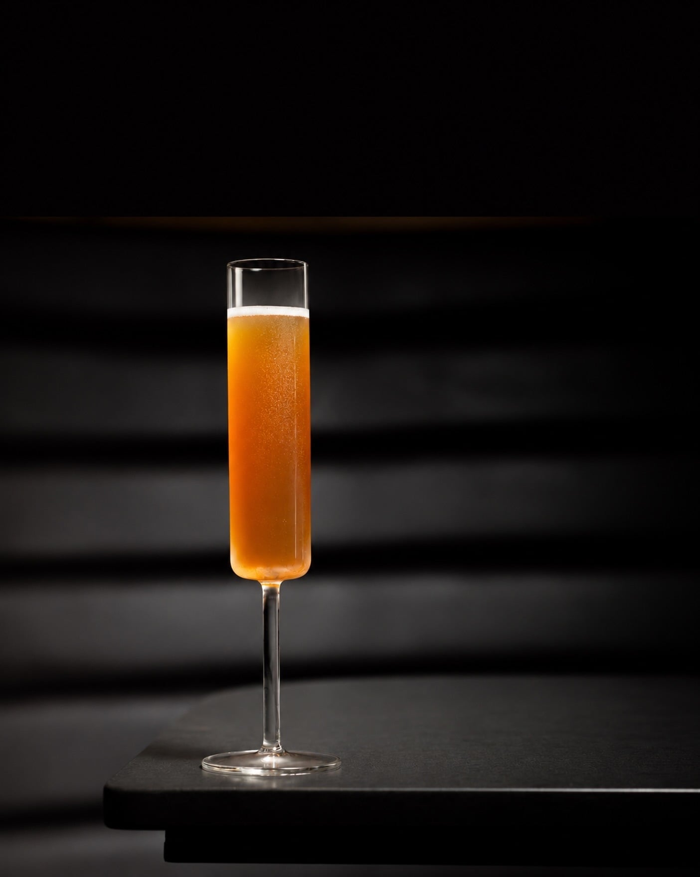 Tanto’s Black Garlic, Pineapple, Champagne cocktail from Menu Three.